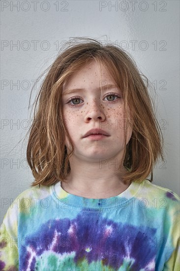 Portrait of child in colorful shirt