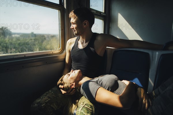 Young couple in train