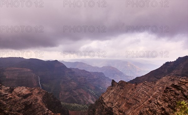 USA, Hawaii, Kauai, Na Pali, Waterfall in mountains