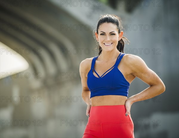 USA, California, Los Angeles, Portrait of woman wearing sports bra