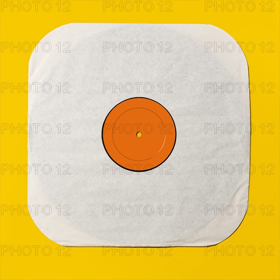 Vintage record on yellow background