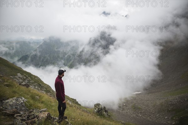 Man hiking in Swiss Alps