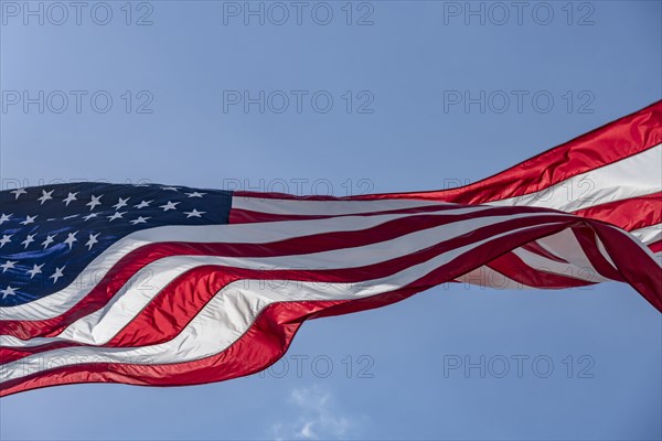 Low angle view of American flag