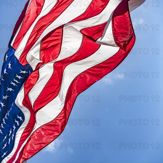 Low angle view of American flag