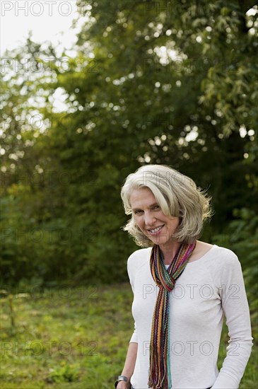 Older woman smiling in park