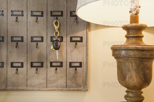 Extreme close-up of lit lamp and keys board at home