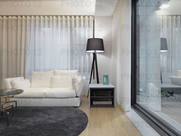 White love seat in modern living room