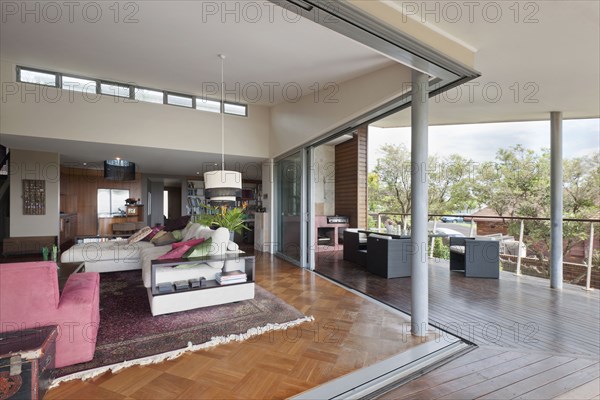 Living area and dining area in open plan house