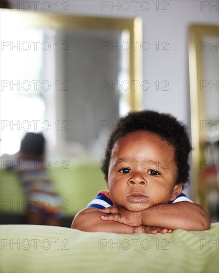 African American baby with arms crossed