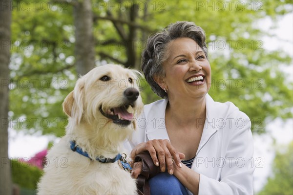 African American woman with dog