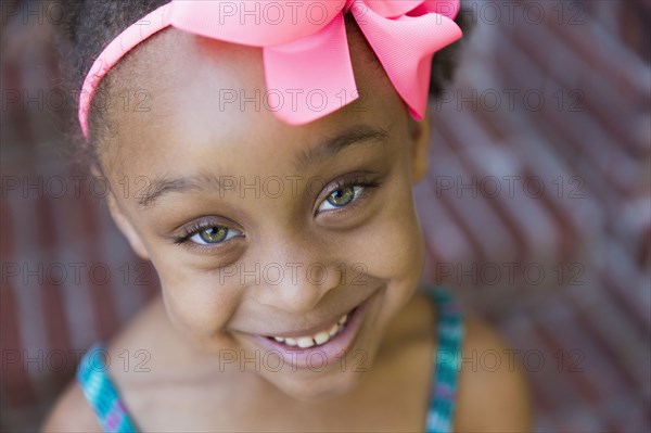 Close up of smiling mixed race girl