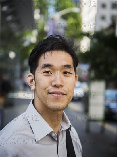 Portrait of smiling Chinese businessman