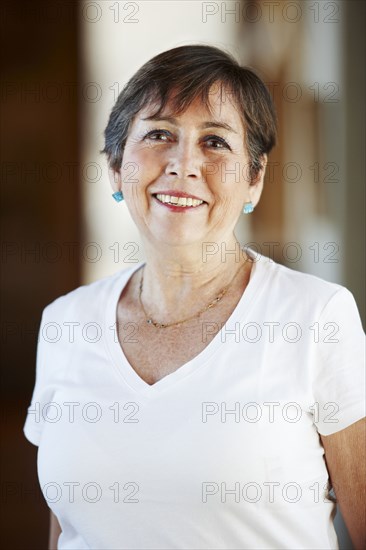 Older Hispanic woman smiling