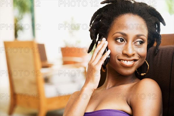 African woman talking on cell phone