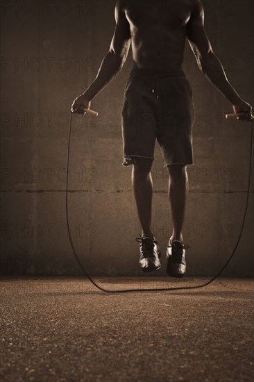 African American man jumping rope