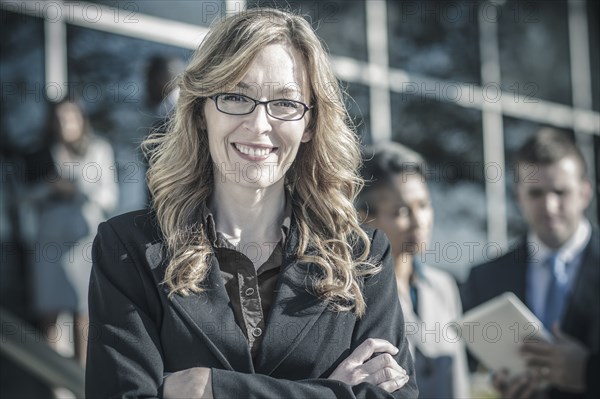 Businesswoman smiling outdoors