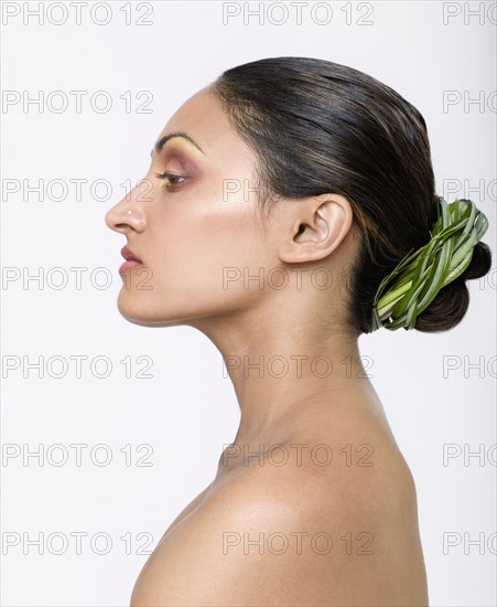 Indian woman with hair wrapped in plant fibers