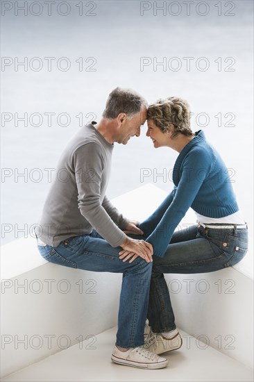 Couple sitting together outdoors