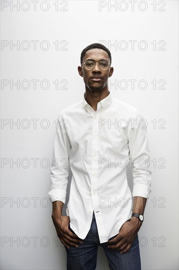 Portrait of serious Black man wearing eyeglasses