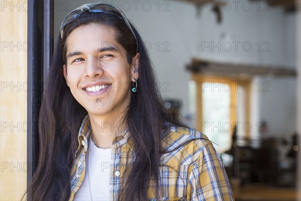 Mixed race man smiling