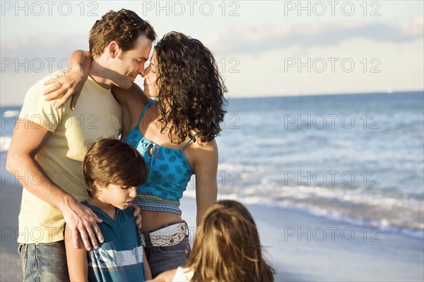 Family enjoying beach