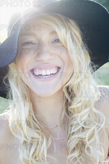 Caucasian woman wearing floppy hat