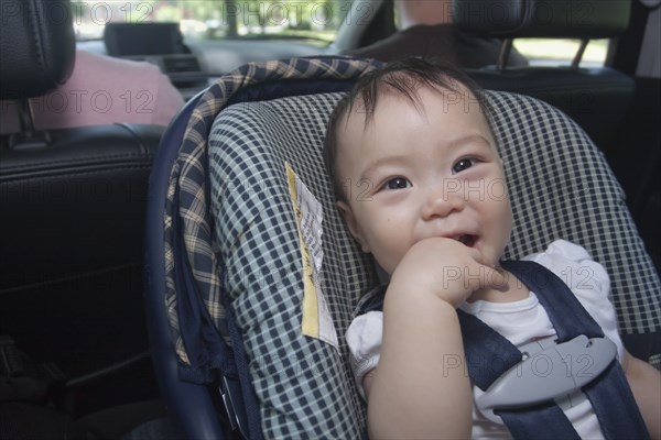 Chinese baby in car seat