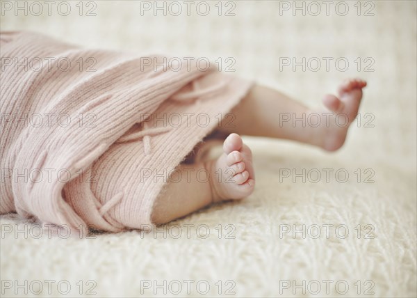 Close up of feet of newborn baby girl