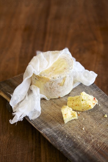 Close up of fresh cheese on cutting board