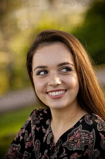 Portrait of smiling Caucasian teenage girl