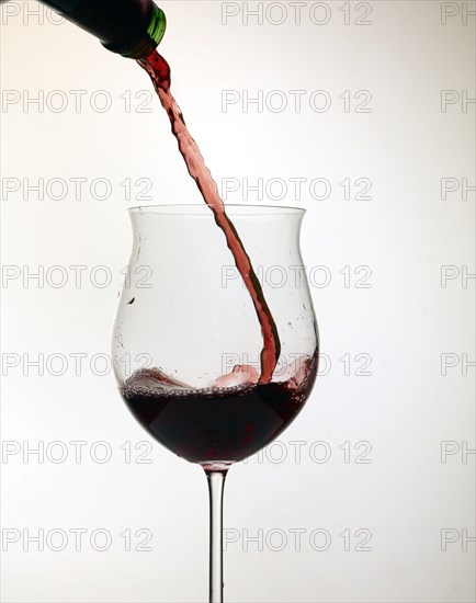 Wine pouring into glass