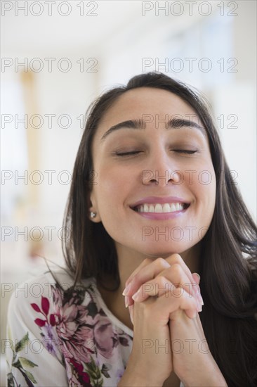 Smiling Caucasian Woman With Hands Clasped Photo12 Tetra Images Jgi Jamie Grill