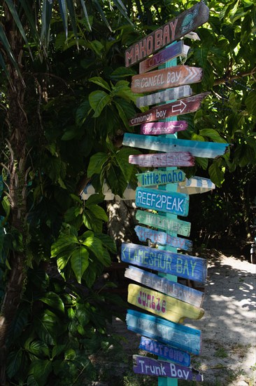 USA, United States Virgin Islands, St. John, Colorful wooden signpost, St. John, United States Virgin Islands, USA