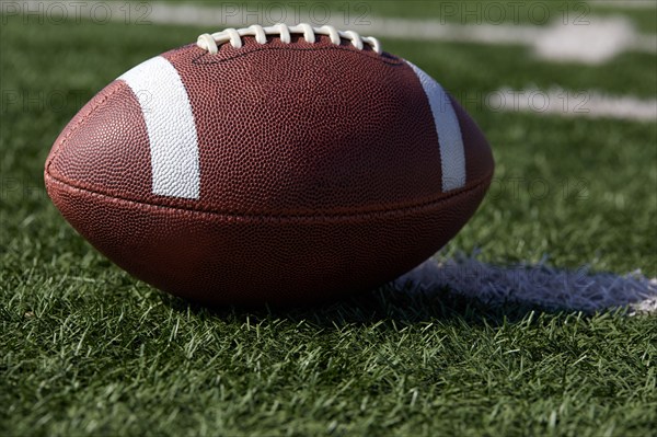 American football ball on field, Phoenix, Arizona, USA