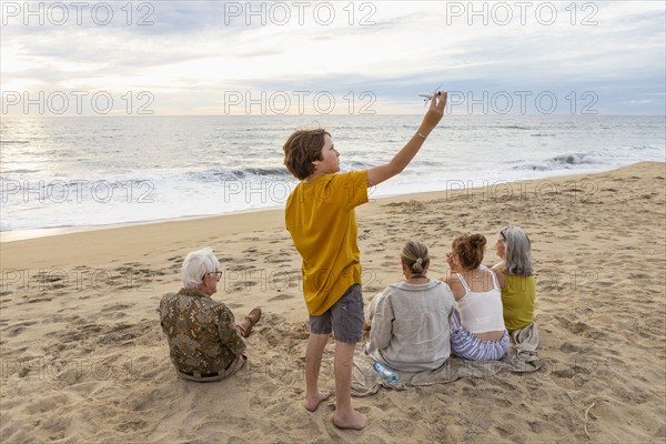 Mexico, Baja, Pescadero, Three generation family on beach, Pescadero, Baja, Mexcio