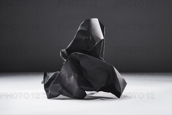 Studio shot of black crumpled paper, Austin, Texas, USA