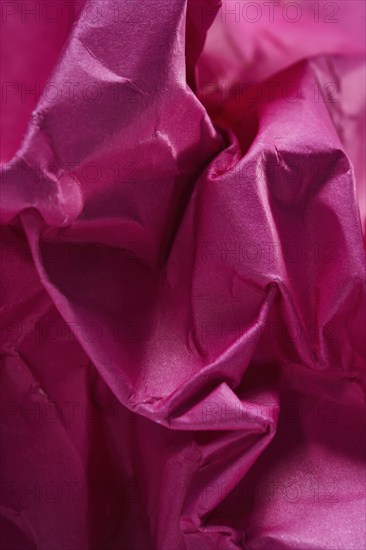 Close-up of pink crumpled paper, Austin, Texas, USA