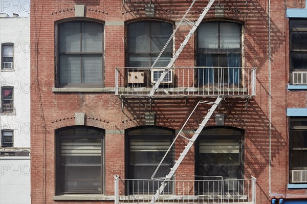 New York City, NY, USA, Apartment building windows and fire escape, New York City, New York, USA