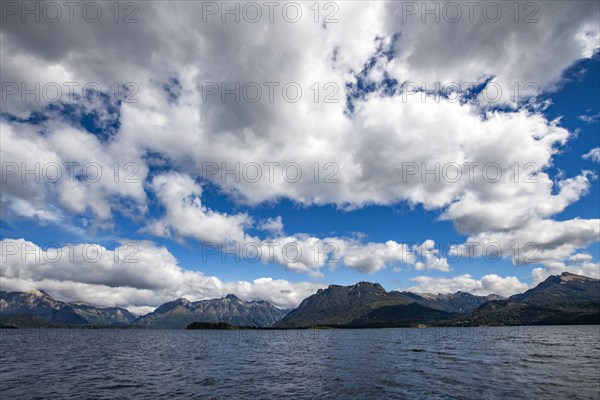 Puffy white clouds over Lake Nahuel Huapi, Bariloche, Rio Negro, Argentina