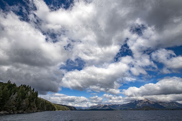 Puffy white clouds over Lake Nahuel Huapi, Bariloche, Rio Negro, Argentina