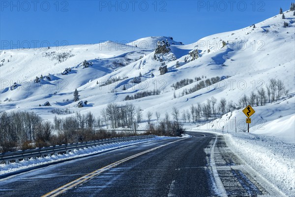 Winding interstate at snow covered foothills, Fairfield, Idaho, USA