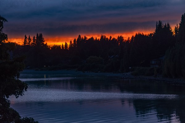 Calm lake and forest at sunrise, Bariloche, , Argentina