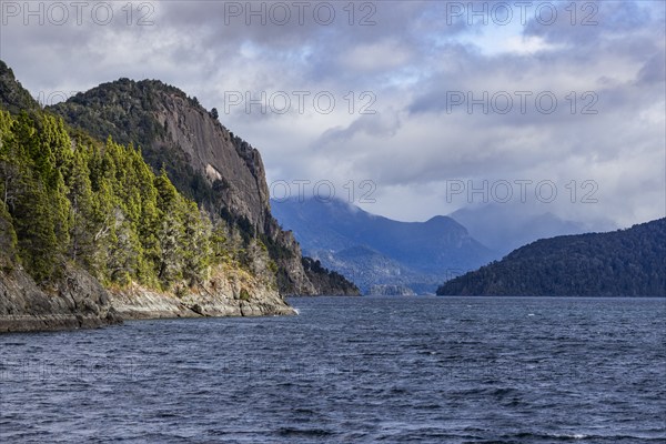 Clouds over rugged shoreline of Lake Nahuel Huapi, Bariloche, Rio Negro, Argentina