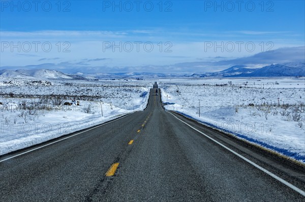 Rural rail fence in snow in early morning , Fairfield, Idaho, USA