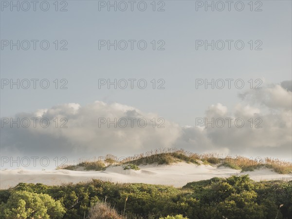 USA, North Carolina, Nags Head, Clouds over sand dunes, Nags Head, North Carolina, USA