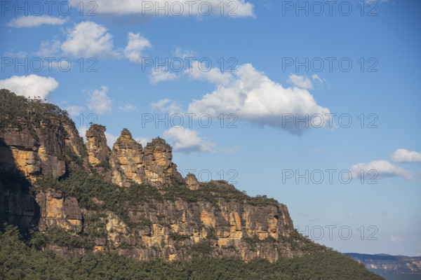 Puffy clouds above rocky mountains
Katoomba, New South Wales, Australia