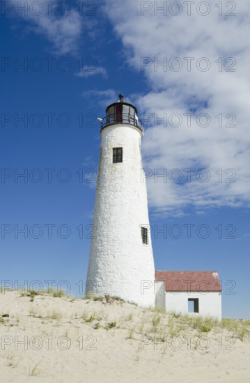 Great Point Lighthouse against sky with puffy clouds
Nantucket, Massachusetts, USA