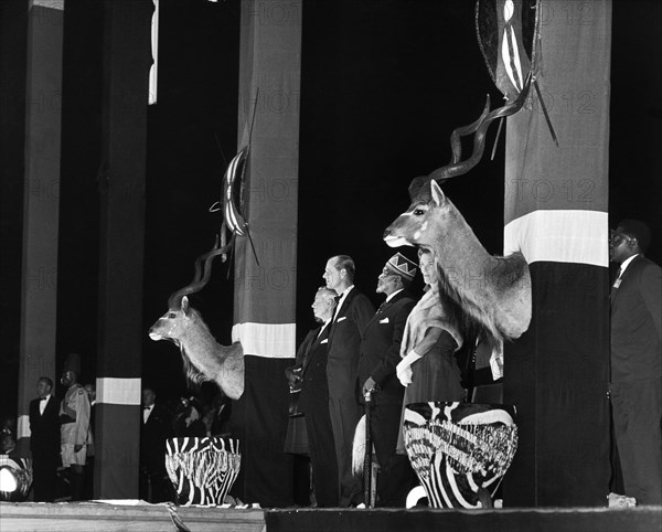 Independence ceremonies at Nairobi. Prince Philip, Duke of Edinburgh, stands next to Jomo Kenyatta, prime minister of newly independent Kenya, at the transfer of power ceremony in Uhuru Park. Nairobi, Kenya, 12 December 1963. Nairobi, Nairobi Area, Kenya, Eastern Africa, Africa.