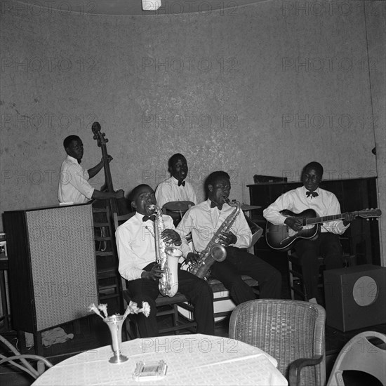 Musicians at the SJAK dance. A band of African musicians play a variety of musical instruments at a dance held for the Sports Journalists Association of Kenya (SJAK). Kenya, 19 August 1955. Kenya, Eastern Africa, Africa.