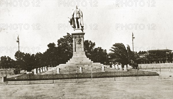 Statue of King Edward VII. A statue of King Edward VII of England, surrounded by a formal grass border and railings. Cape Town, Cape Province (West Cape), South Africa, 22-29 December 1923. Cape Town, West Cape, South Africa, Southern Africa, Africa.